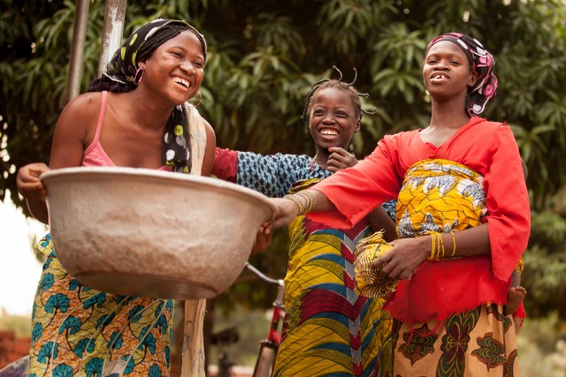 Women laughing in Burkina Faso