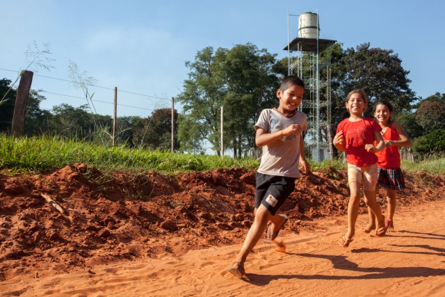 Kids running in San Pedro, Guatemala